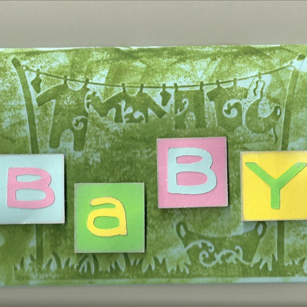 Cuttlebug 4” x 6” baby clothes line embossing folder